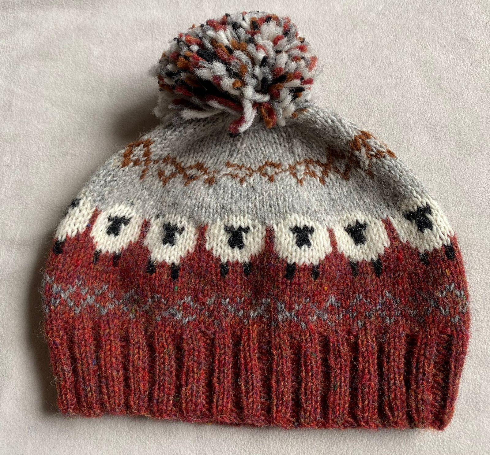Hand Knitted Pure Wool Fair Isle Sheep Design Unisex Bobble Beanie Rust Heather NK254 - Image 3